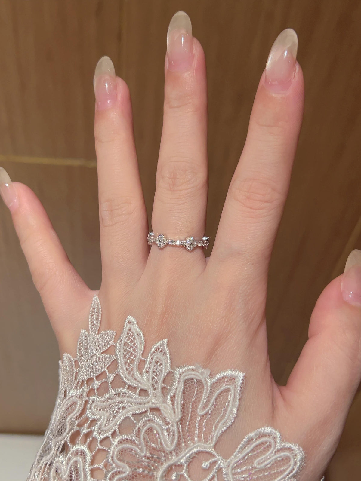 Fleurette · Petal Moissanite Eternity Band