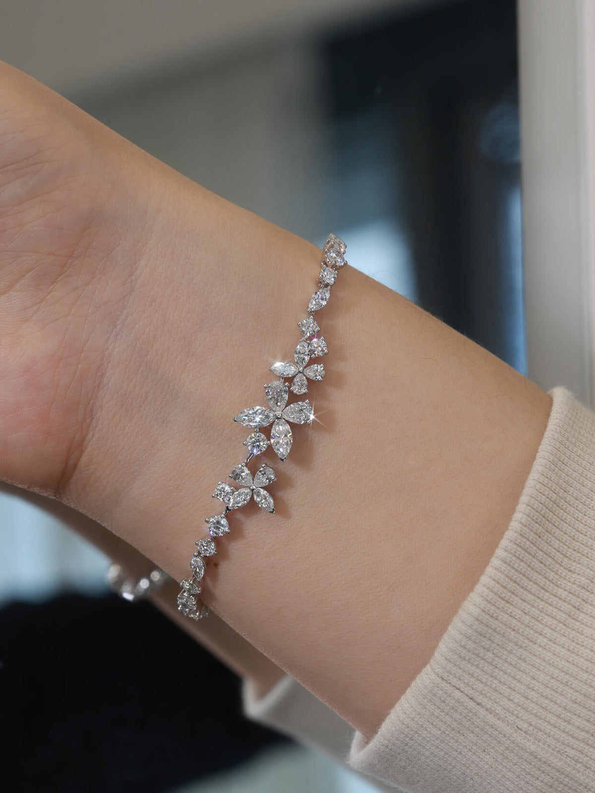 Butterfly moissanite bracelet worn on the wrist